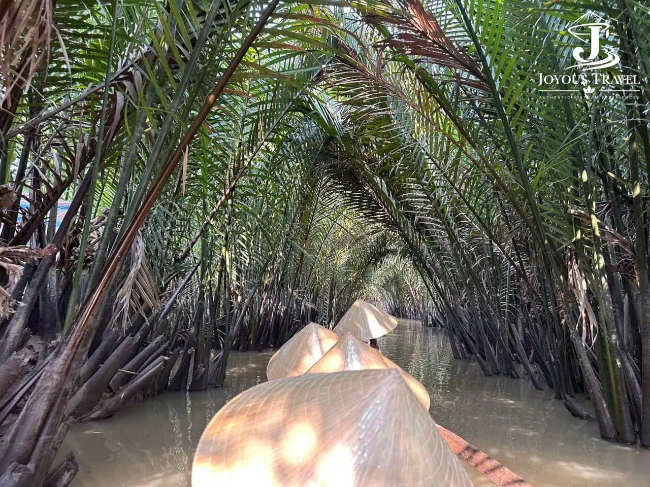 Paddling a sampan on the Mekong
